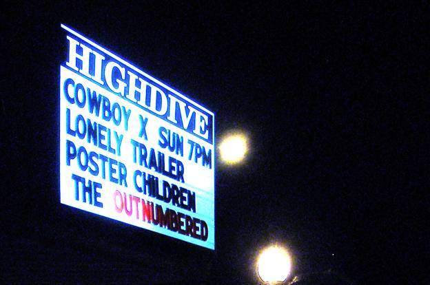 A marquee for the live music venue Highdive displaying bands "Cowboy X, Lonely Trailer, Poster Children and The OutNumbered".
