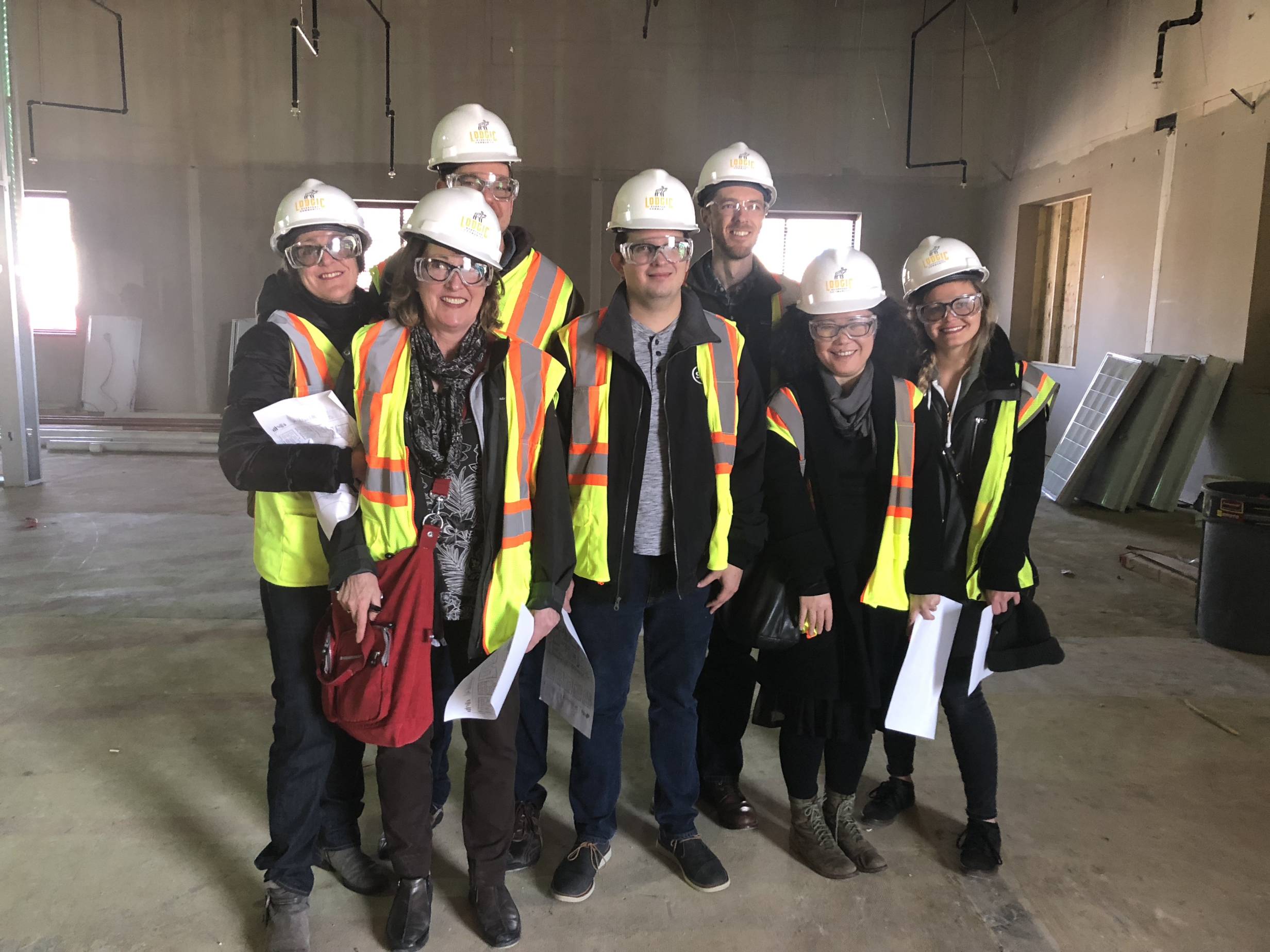 Commissioned artists tour Lodgic Everyday Community construction site