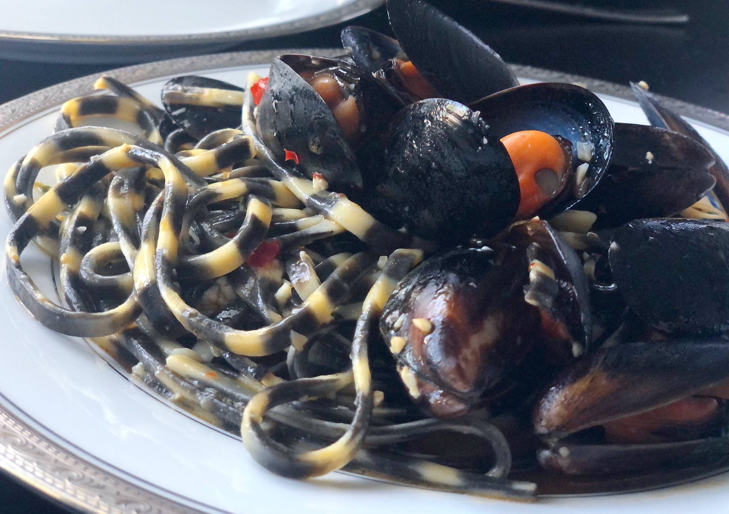 Check out NAYA’s squid ink pasta with mussels