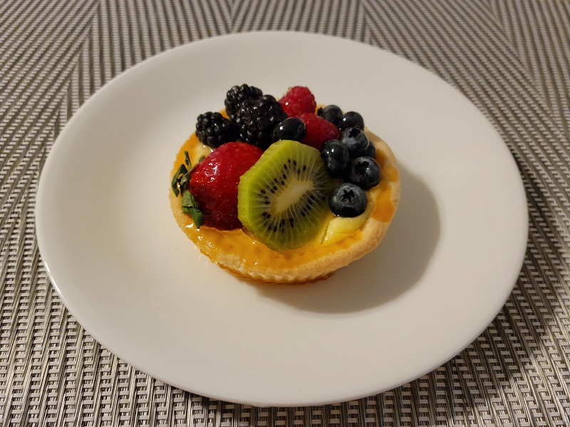 Colorful fruit tart on a plate. Photo by Matthew Macomber.