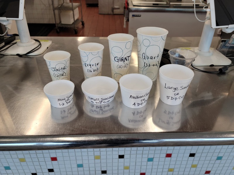 Cups showing the four sundae (one to five) and other treat (12 ounces to 32 ounces) sizes. Photo by Matthew Macomber.