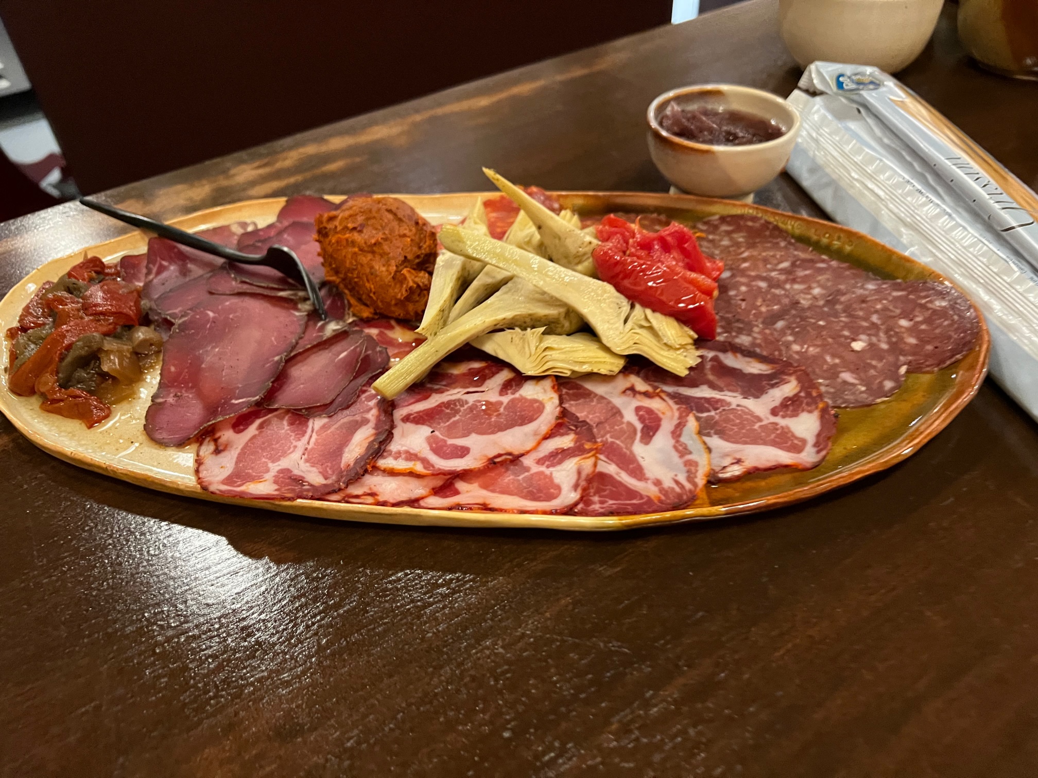 On a large platter, there are variety of cured and smoked meats. Photo by Alyssa Buckley.