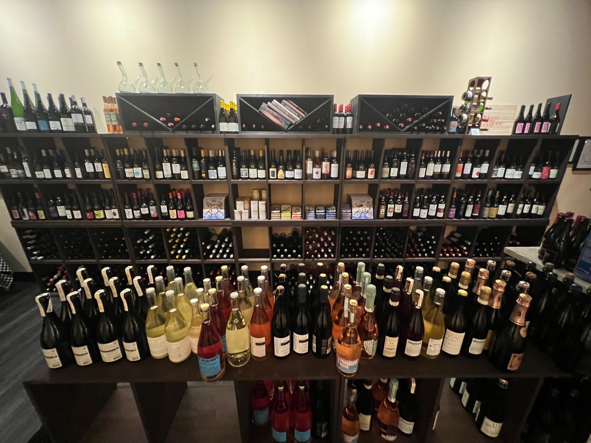 Inside Ladro Enoteca, there are shelves of wine. Photo by Alyssa Buckley.