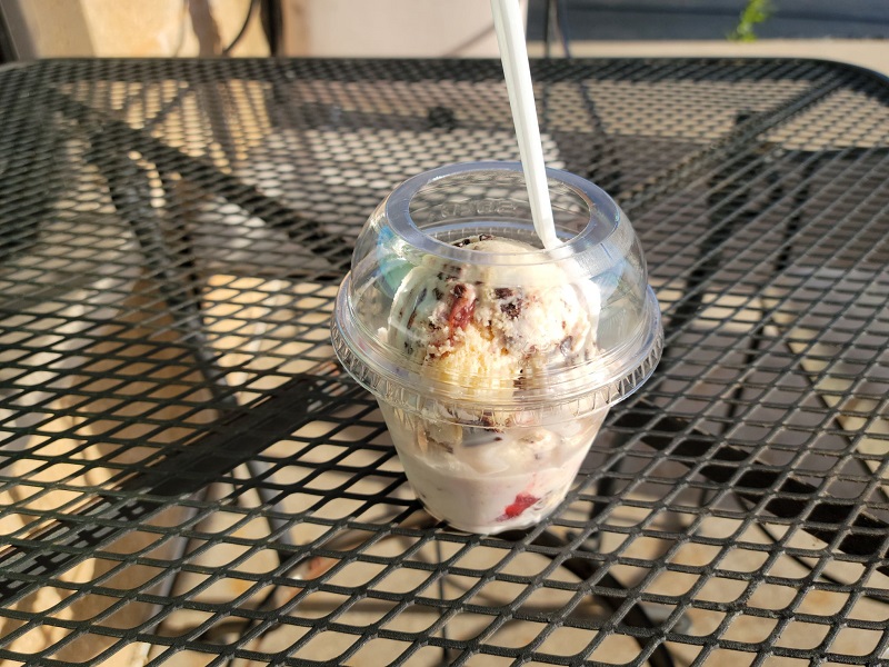 A cup of Gancito ice cream on an outdoor table at El Oasis. Photo by Matthew Macomber.