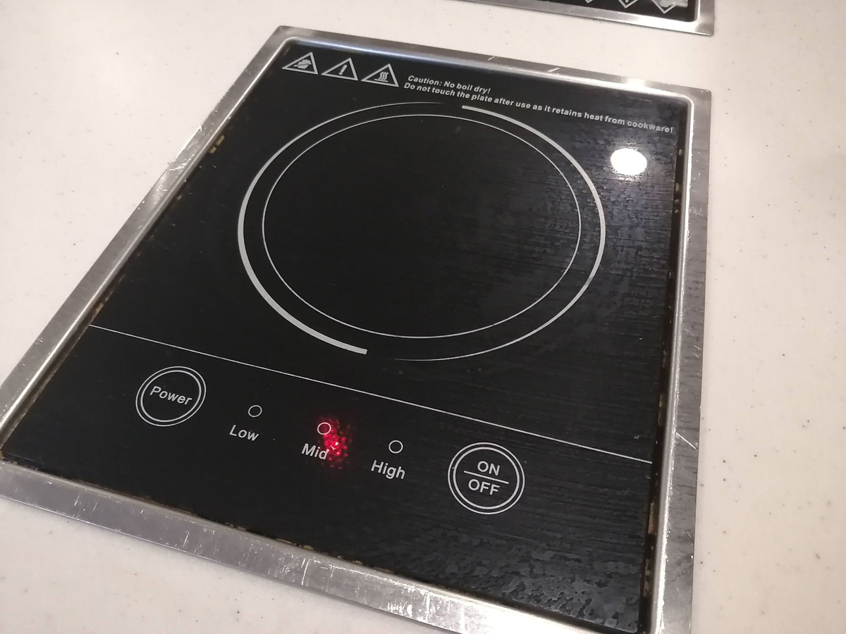 A picture of an induction stove top on a table. Photo by Paul Young.