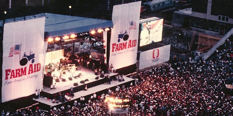 An aerial shot of the stage and crowd at the original Farm Aid show at Memorial Stadium in1985.