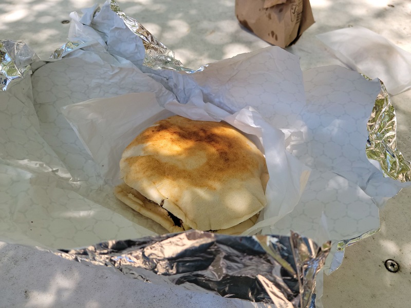 A beef shawarma pita sandwich formerly wrapped in foil to keep it warm. Photo by Matthew Macomber.