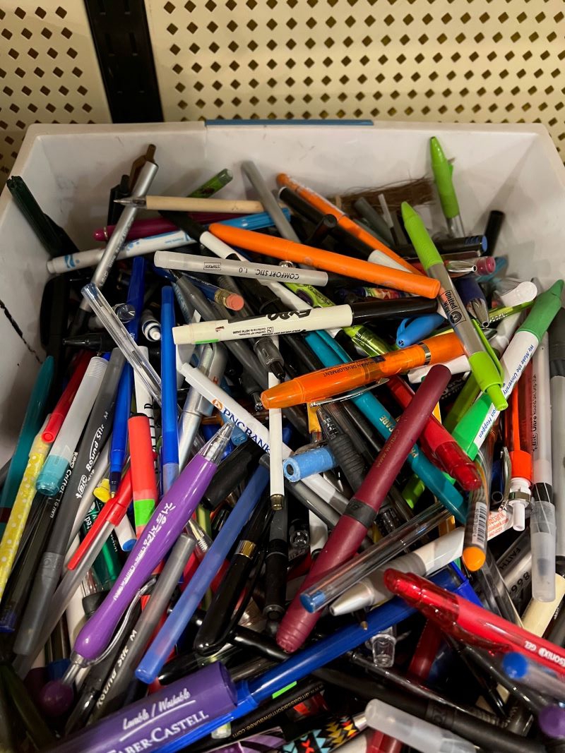A bin filled with all different types of pens. Photo by Julie McClure.