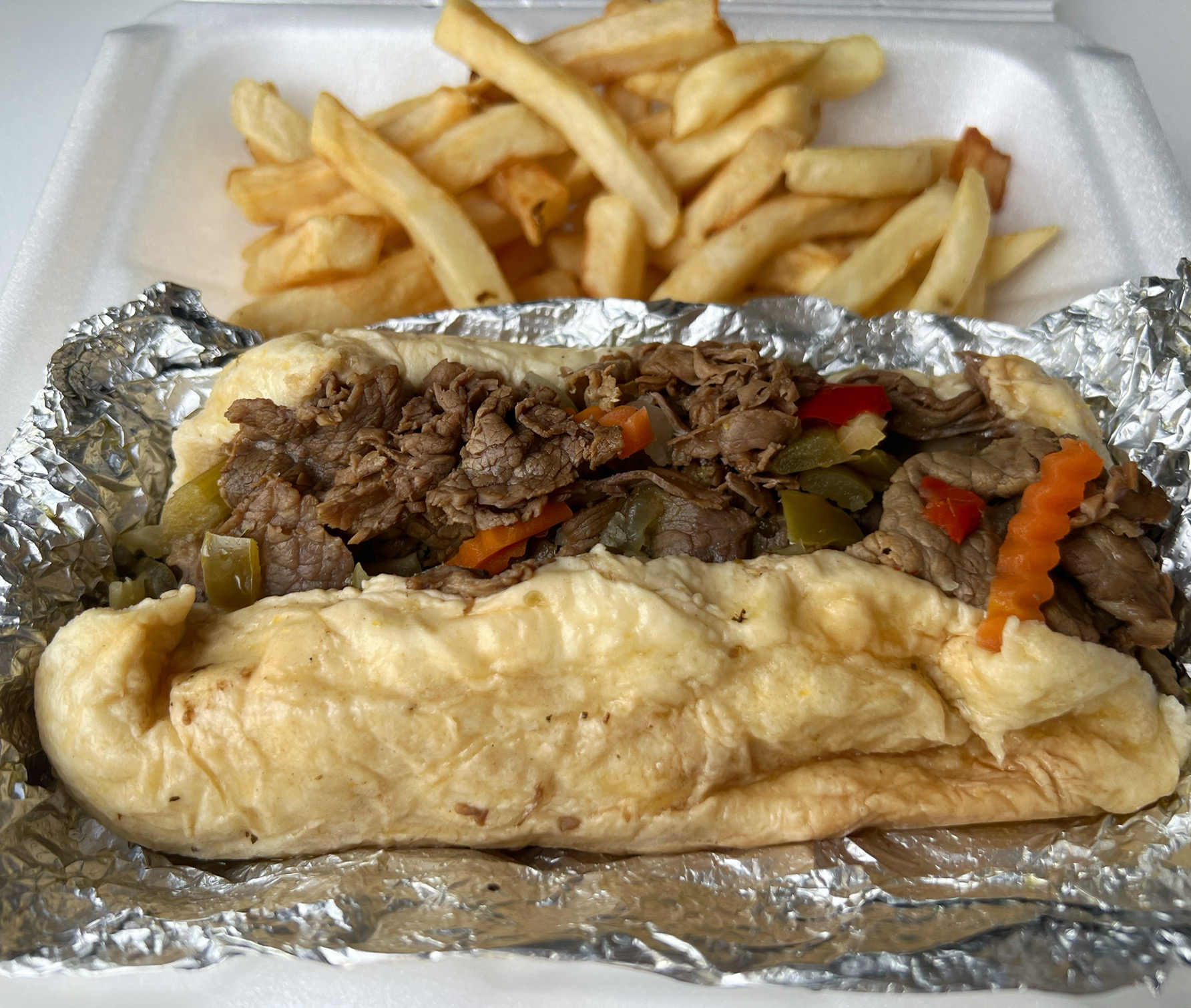 Unwrapped from foil but resting on top is an Italian beef sandwich from Garro's Taste of the City. Photo by Alyssa Buckley.