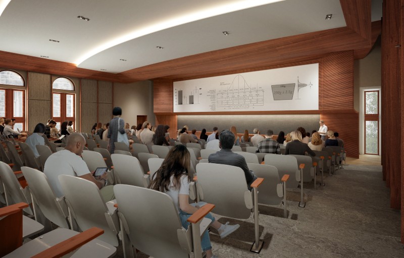 A rendering of a lecture hall with seats in rows facing a large rectangular screen. Image from Liberal Arts and Sciences website.