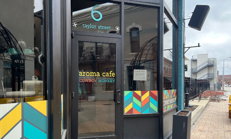 The exterior of Cowboy Monkey and Aroma Cafe. The lights inside are off on a winter morning. Photo by Alyssa Buckley.
