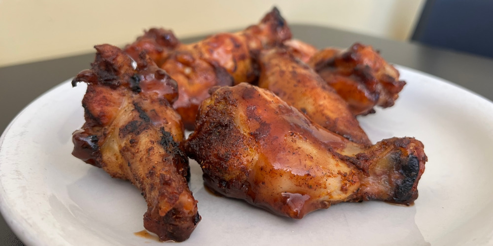 A cropped header image of wings from Po' Boys in Urbana, Illinois. Photo by Alyssa Buckley