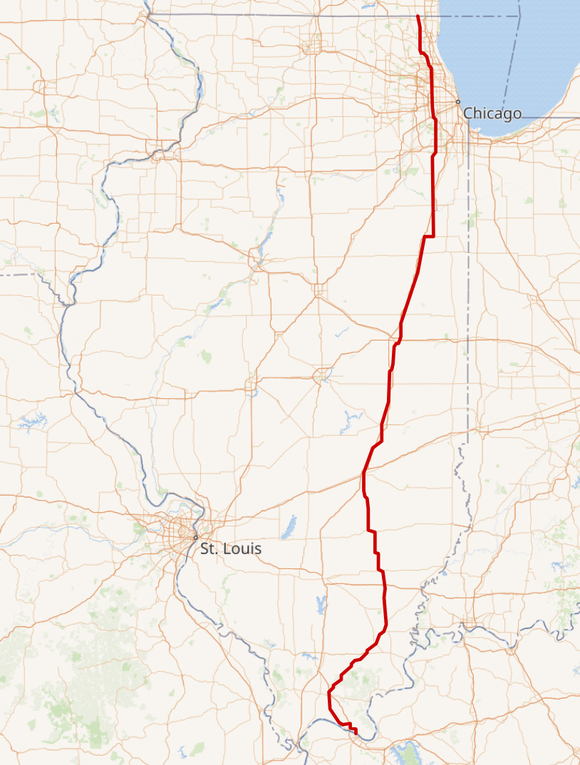 A map of Illinois that shows county lines and major roads. One road that stretches from the top to the bottom is outlined in red.