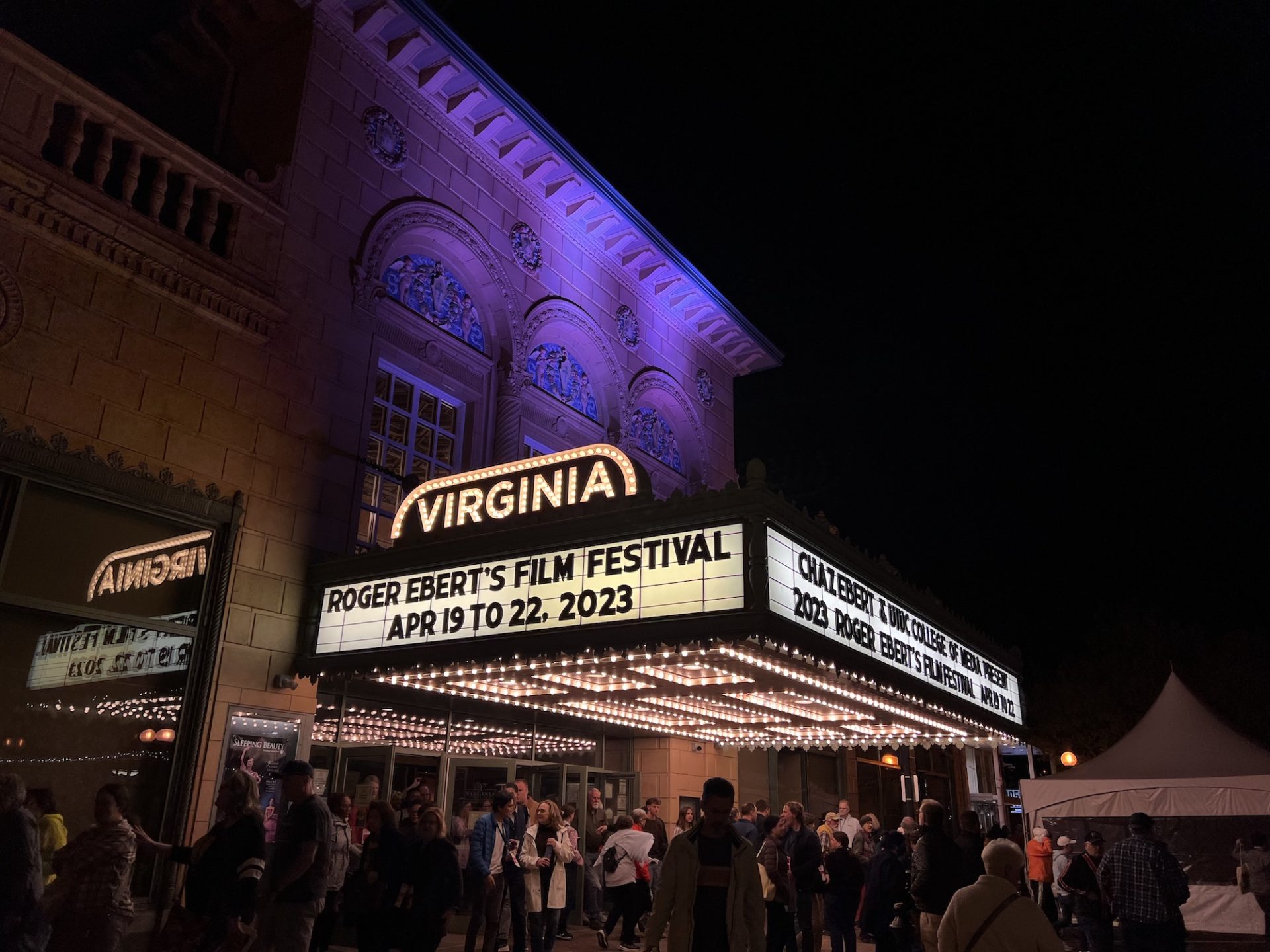 An outside nighttime shot of the marquee at the Virginia Theatre reads Roger Ebert's Film Festival April 19 to 22 2023