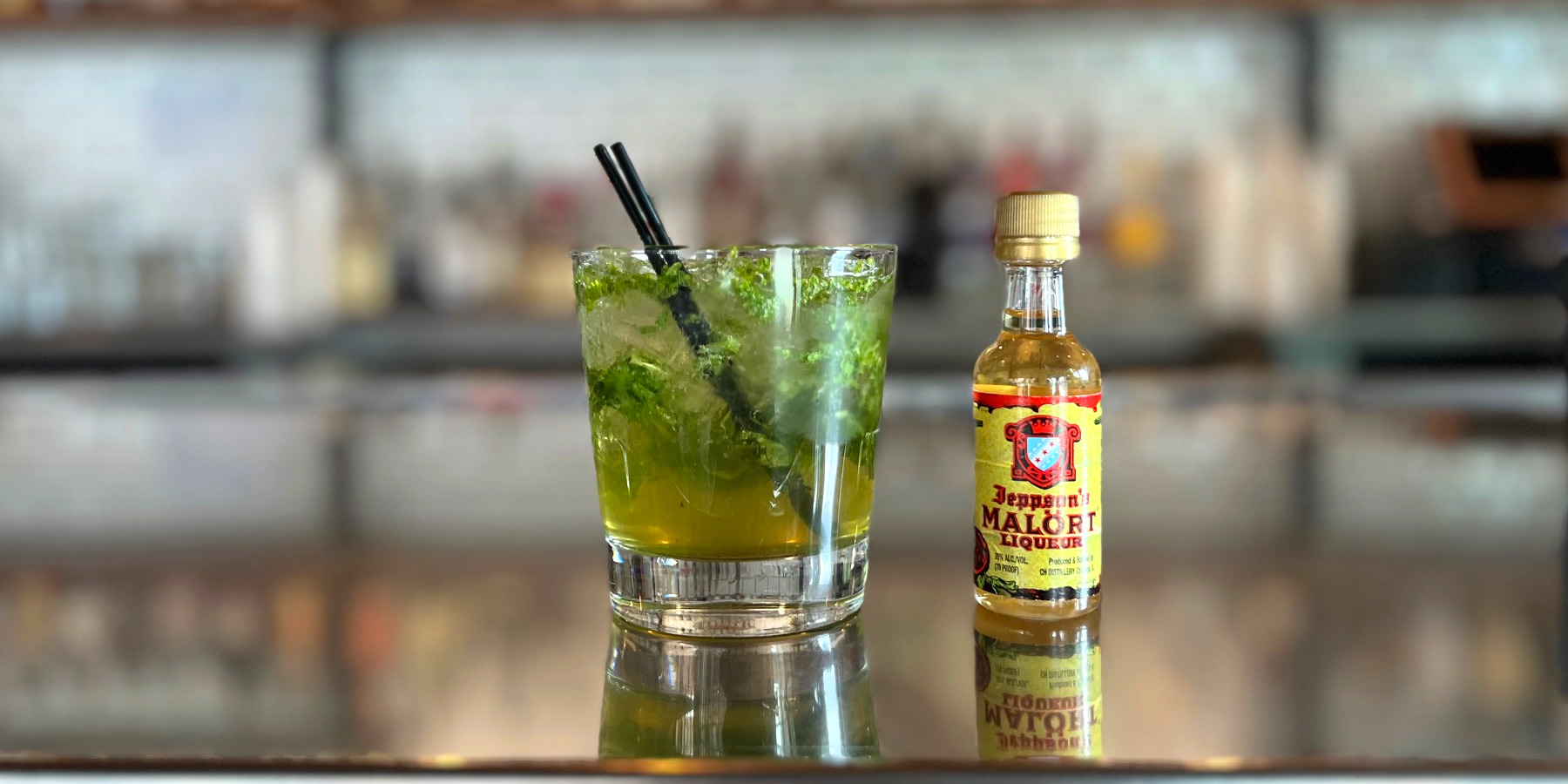 For Malört Fest 2023, there are five Champaign bars competing in a Malört cocktail competition. Pictured is Pour Bros Taproom's entry for the Malört Fest cocktail competition with fresh herbs. Photo by Alyssa Buckley.