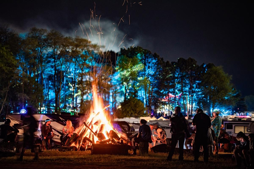 A large bonfire at a camping site at the Summer Camp Music Festival