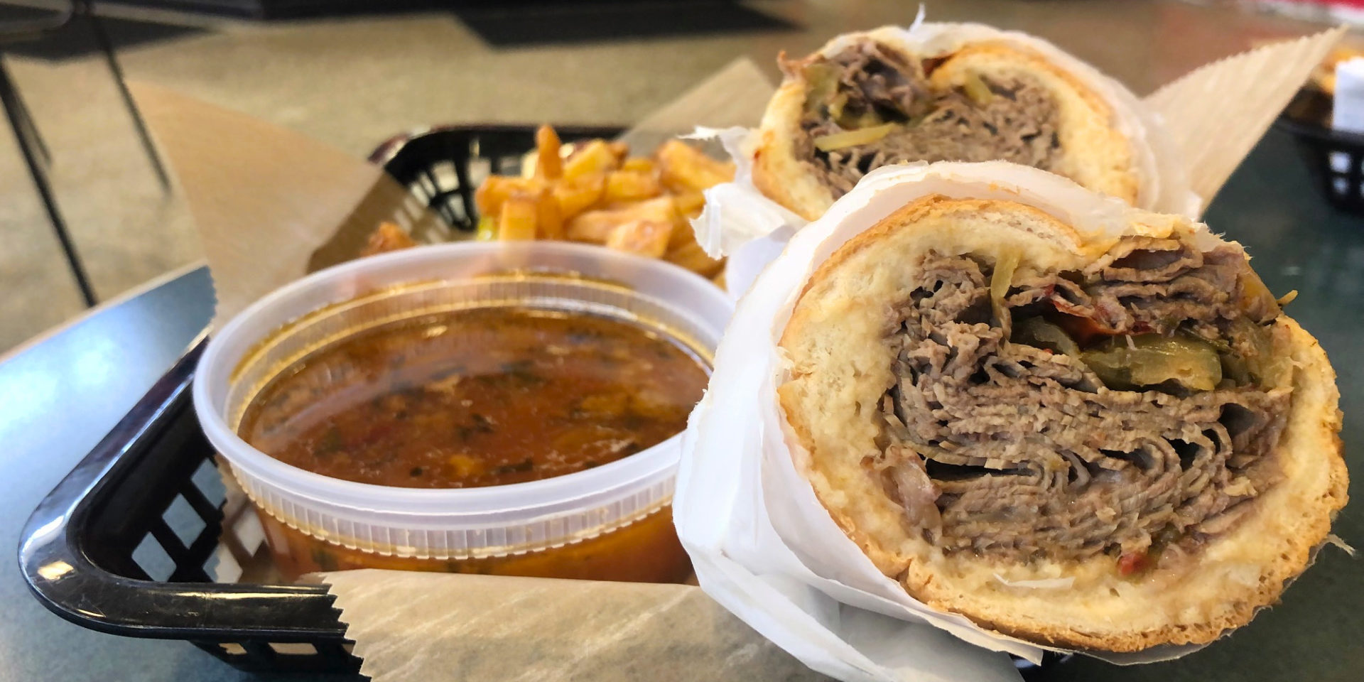A cropped photo of an Italian beef sandwich in Champaign-Urbana. This is from Baldarotta's in the Lincoln Square Mall in Urbana, Illinois. Photo by Alyssa Buckley.