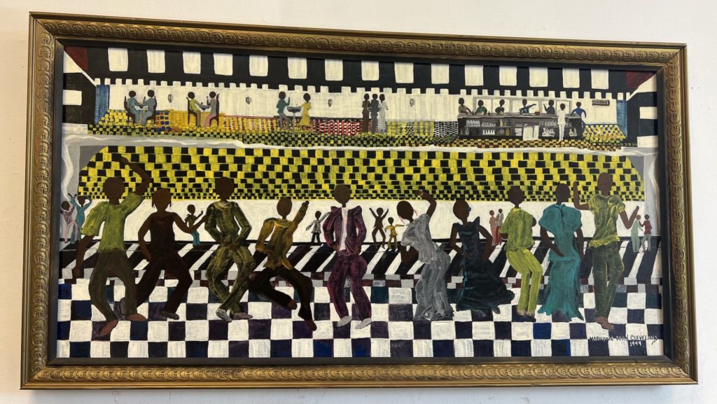 Painting by Marilyn Dean Cleveland, a group of Black dancers are in the foreground on a black and white checkered floor. 