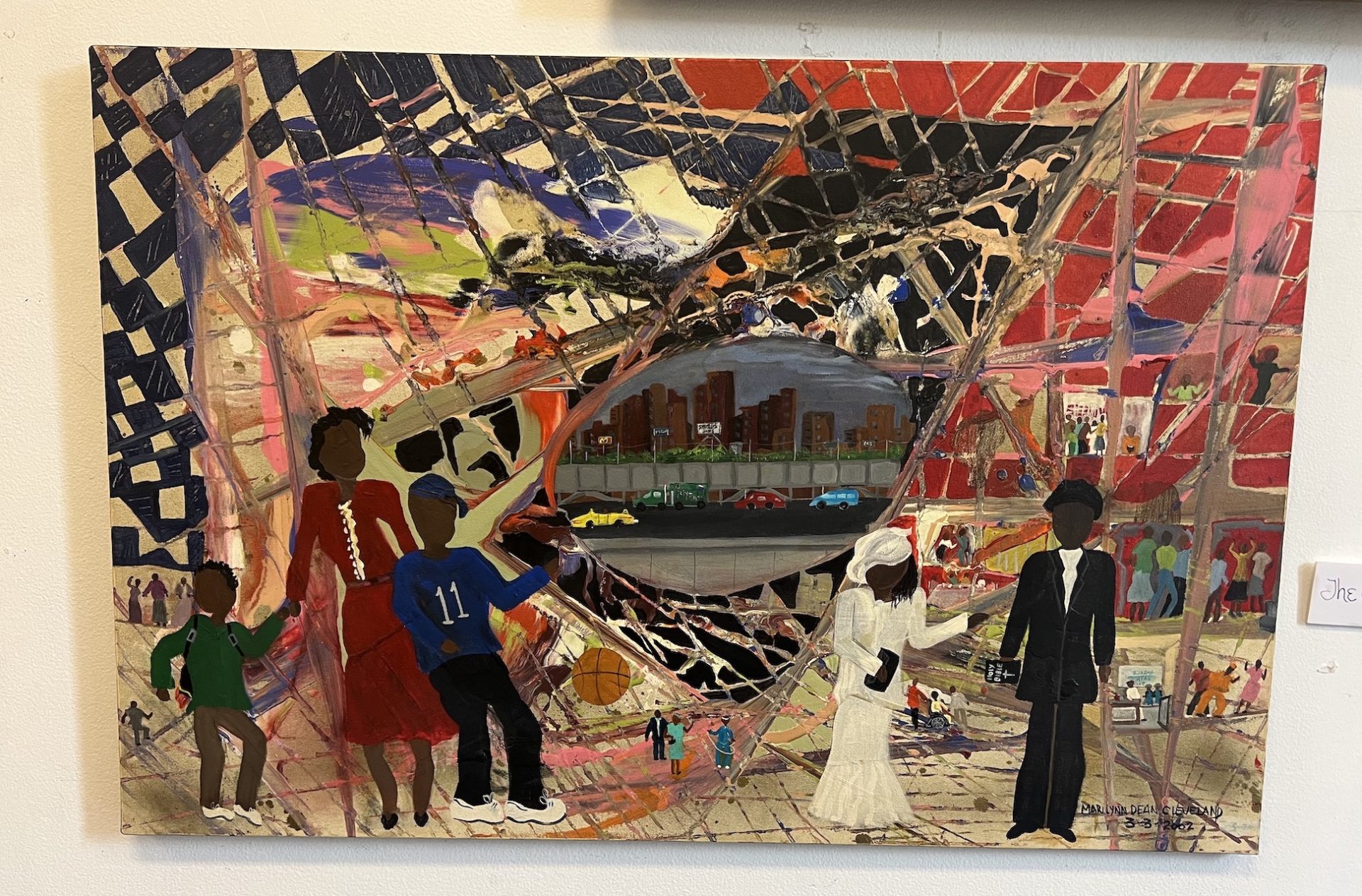 Painting: The City by Marilynn Dean Cleveland features a group of Black people in the foreground. Abstract shapes are behind them, including something that resembles the Bean sculpture in Chicago. The city is reflected in the central Bean shape. The background is made up of abstract paint strokes. The painting is primarily dark: reds, blues, greys.