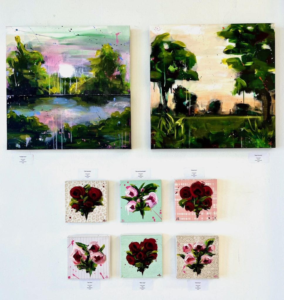 2 large square floral and landscapes hang on a wall with six smaller square florals displayed below