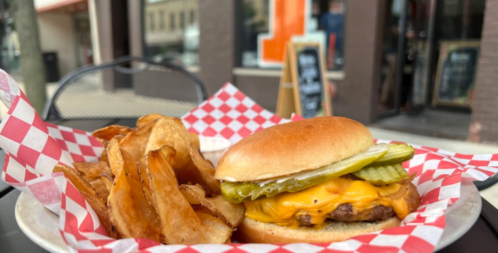 A cropped image of a burger by Farren's Pub in Champaign, Illinois. Photo by Alyssa Buckley.