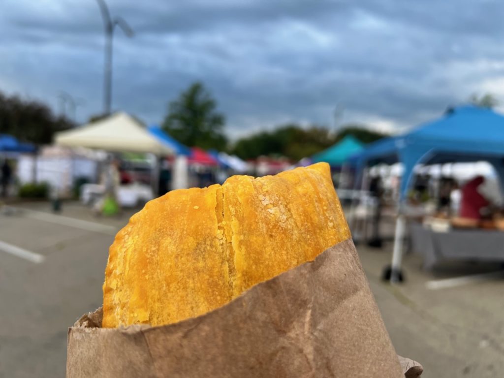 A beef handpie from Stango Cuisine at the Urbana Market at the Square. Photo by Alyssa Buckley