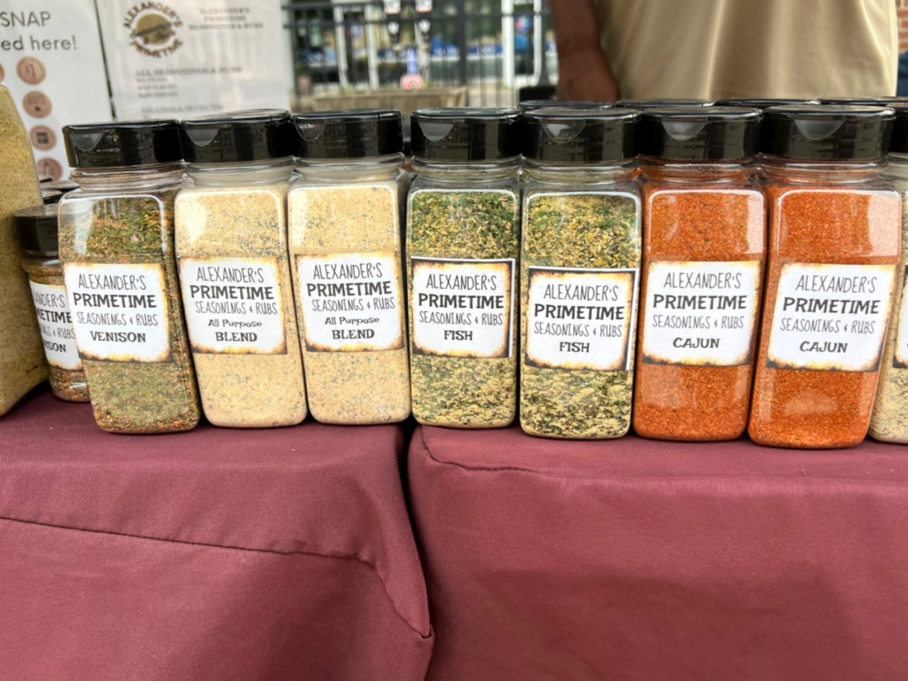 At Champaign farmers' market, there is Alexander's Primtetime seasonings and Rubs are for sale at the Champaign farmers' market. Photo by Alyssa Buckley