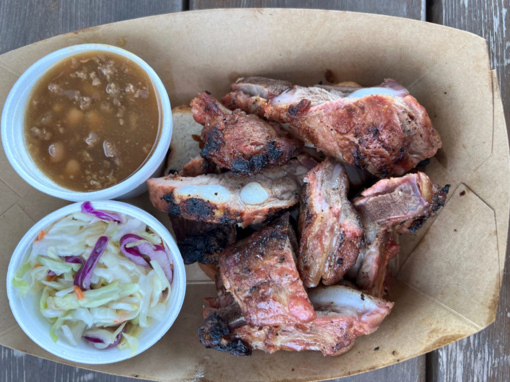 In the basket of rib tips, there are two sides: coleslaw and baked beans. Photo by Alyssa Buckley.