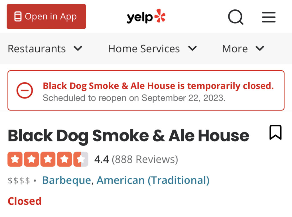 A screenshot of Yelp.com on August 17, 2023 of Black Dog Smoke & Ale House restaurant listing which reads that the restaurant is temporarily closed. Additionally it reads, "Scheduled to reopen on September 22, 2023." Screen grab by Alyssa Buckley.