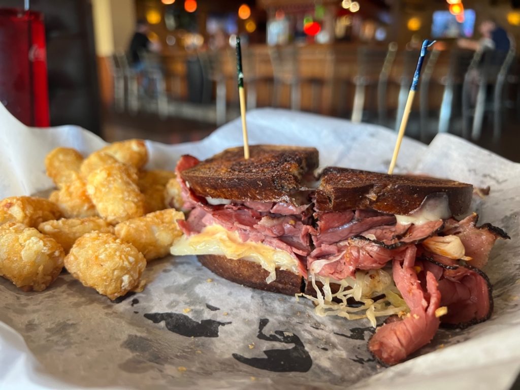 A reuben sandwich with a side of tots from Guido's in Champaign. Photo by Alyssa Buckley.