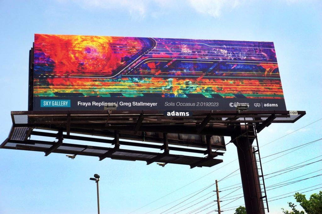 a billboard of Replinger and Stallwater's brightly colored abstract collaborative piece.