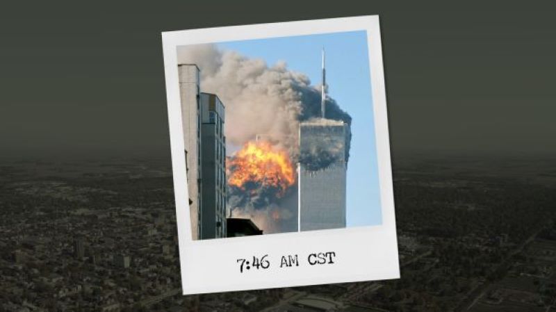 A graphic of a polaroid photo depicting the twin towers after the planes had crashed into them. It's juxtaposed on an image of an aerial view of Manhatten.