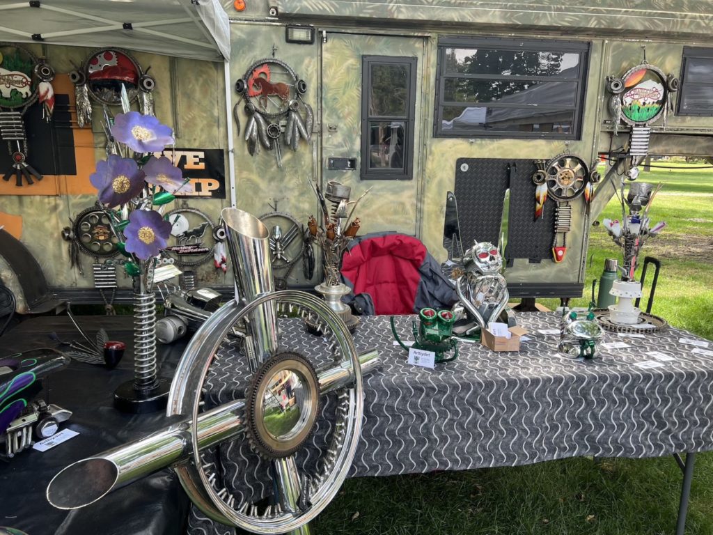 an assortment of metal art creations created with Harley Davidson parts