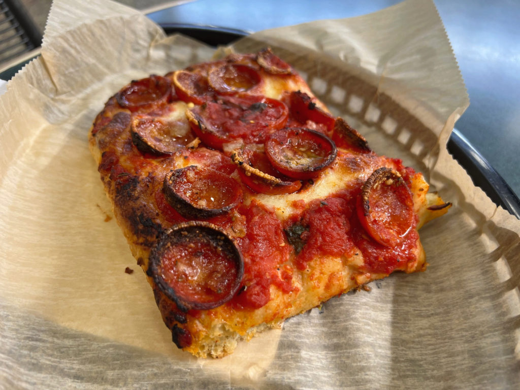 A side view of Detroit style pizza in Urbana