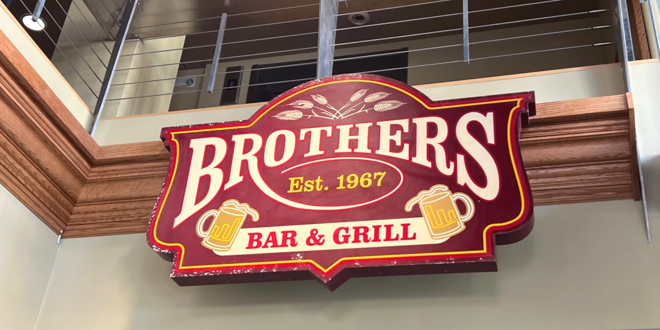 Hung inside the new location, the sign for Brothers Bar & Grill (est. 1967) hangs above the entrance in Champaign.
