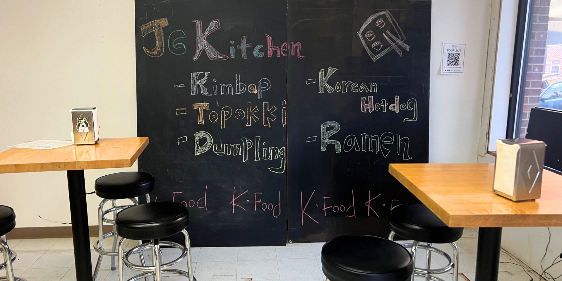 The interior of J6 Kitchen has a chalkboard wall reading "kimbap, topokki, dumpling, Korean hot dog, and ramen" advertising K-food.