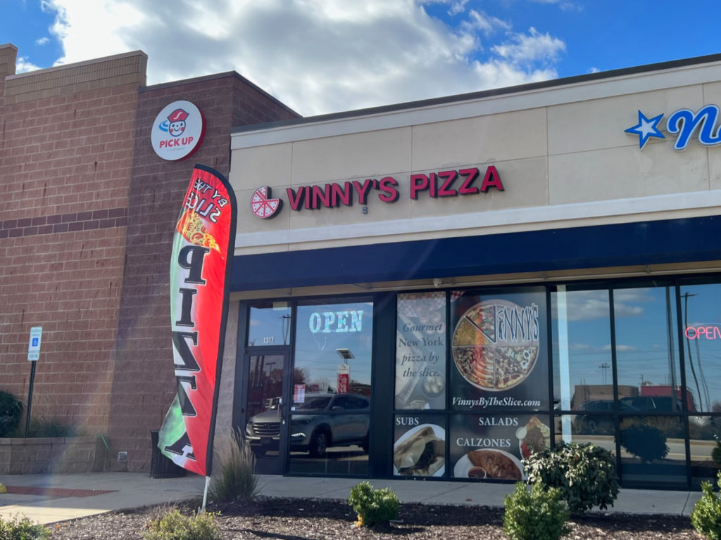 The exterior of Vinny's Pizza in Savoy.