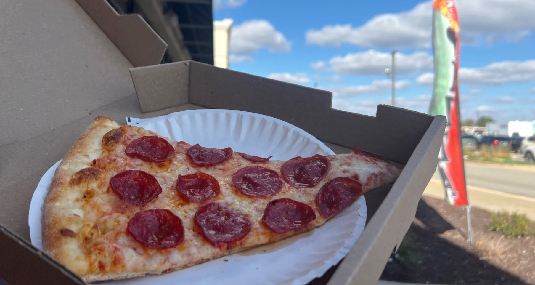 A slice of NY-style pizza from Vinny's Pizza By The Slice in Savoy, Illinois.