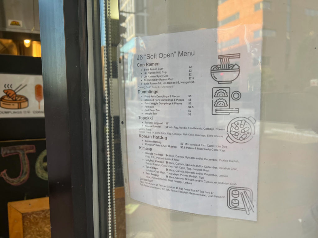 The posted menu for J6's soft open in Campustown.