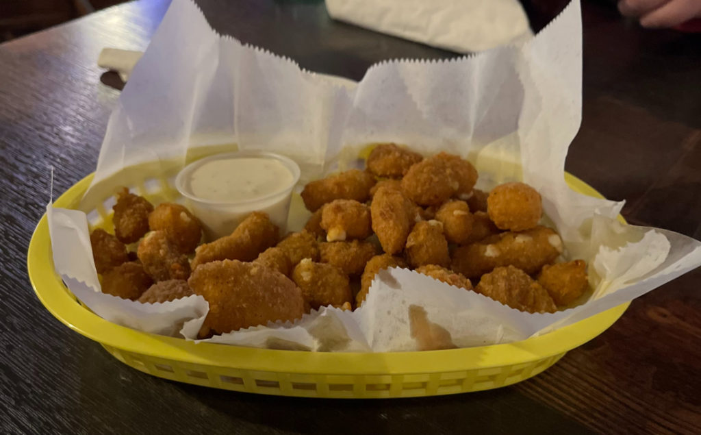 Philo Tavern cheese curds in a yellow basket.