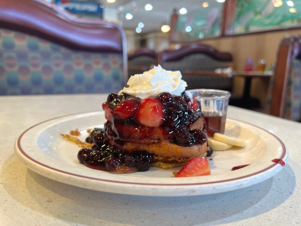 A stack of fruit French toast at Sammy's Pancake House.