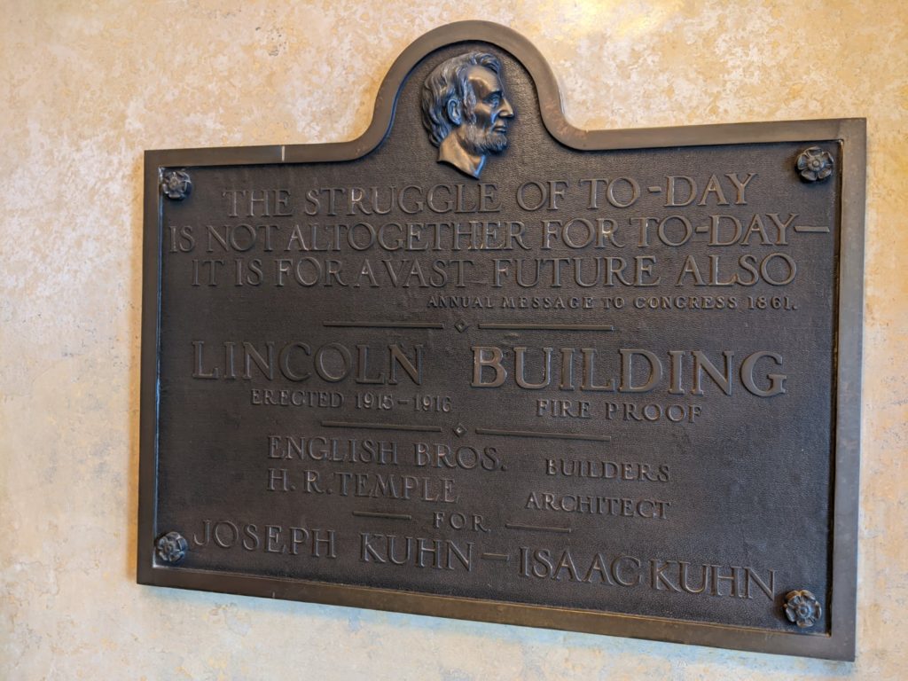 The Lincoln tablet. A bronze plaque with Lincolns profile and information about the building. 