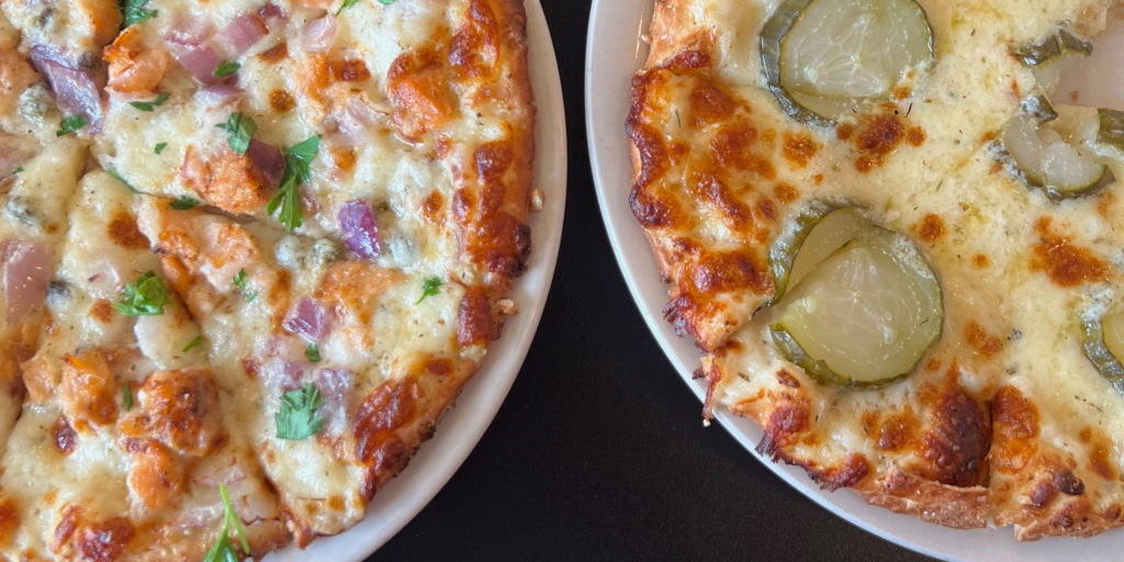 Two Restaurant Week pizzas at Po' Boys restaurant in Urbana, Illinois.