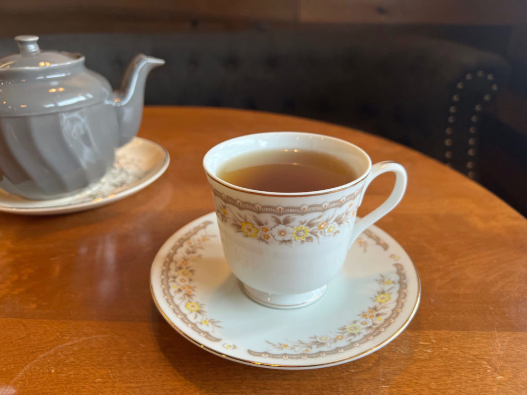 A tea cup and saucer of brain booster tea by Walnut Street Tea Company in Champaign, Illinois.