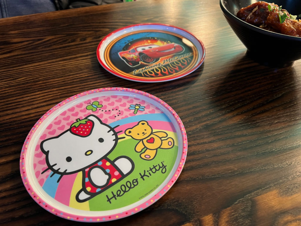Hello Kitty and Lightning McQueen plates at The Space restaurant, a quirky burger joint in Champaign, Illinois.