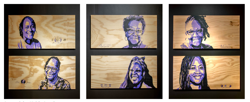 Six wooden panels featuring painted headshots of Black women smiling.