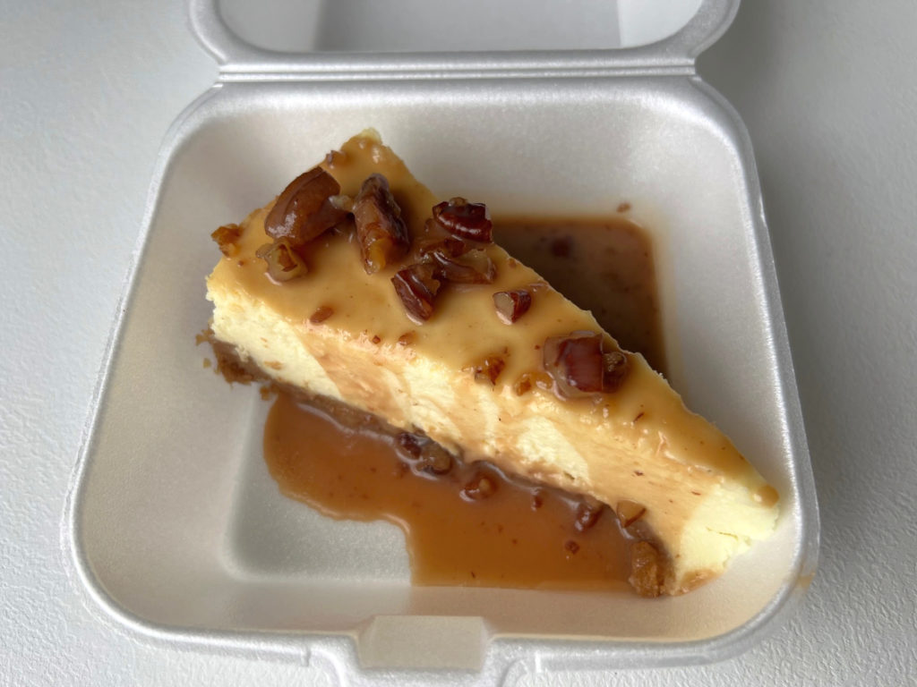A slice of bourbon caramel cheesecake from Sooie Bros restaurant in Champaign.