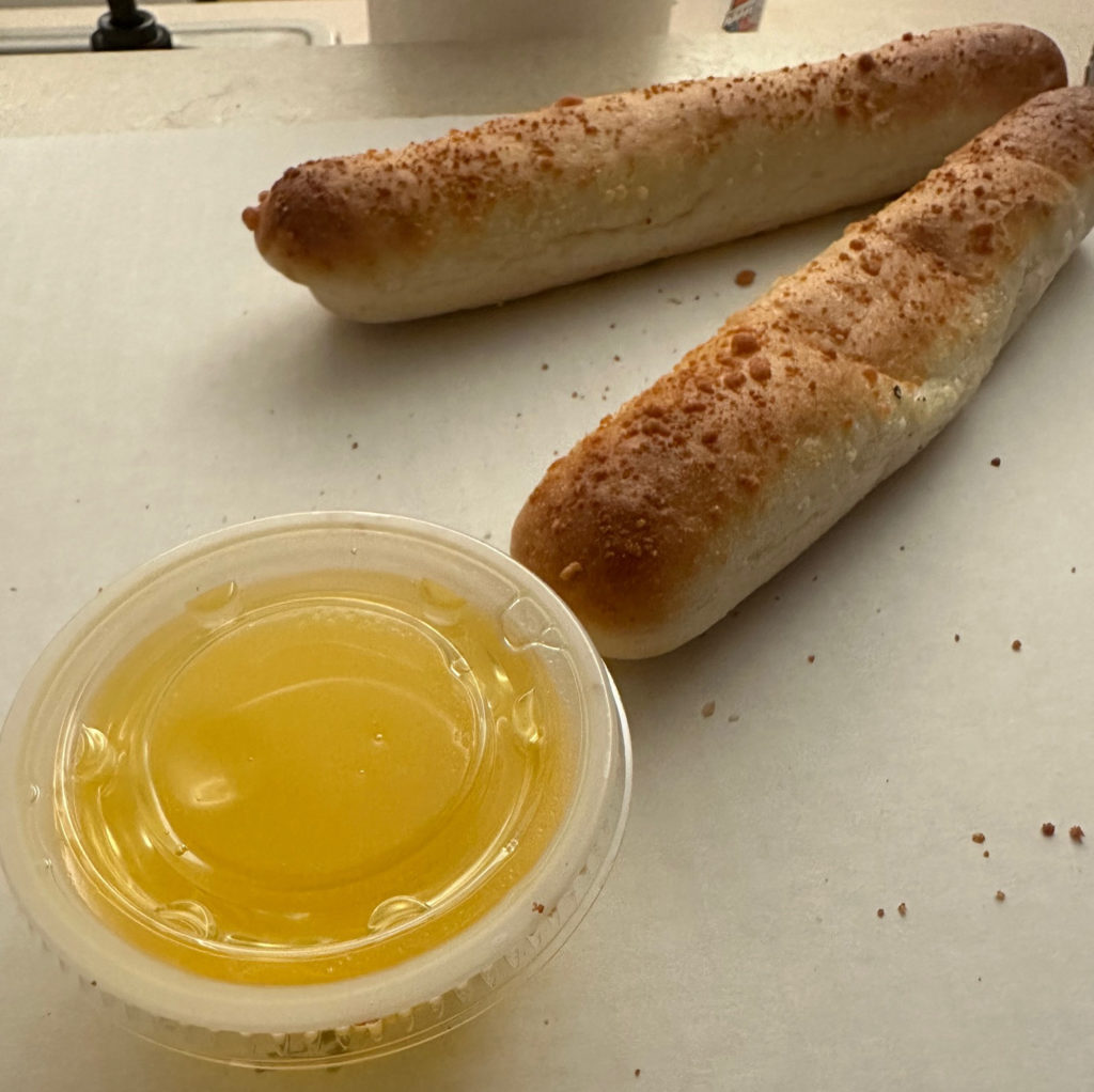 Two breadsticks at Garcia's Pizza in a Pan.