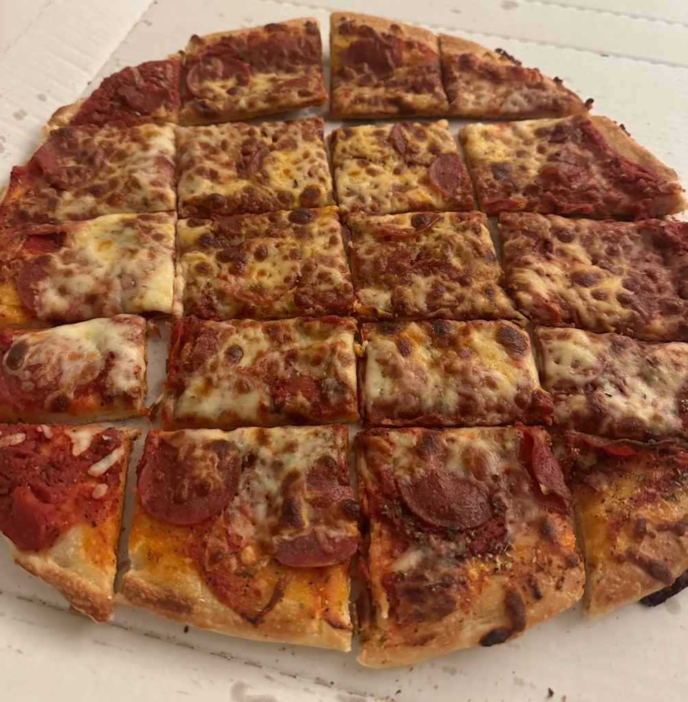 Garcia's Pizza sliced into squares.