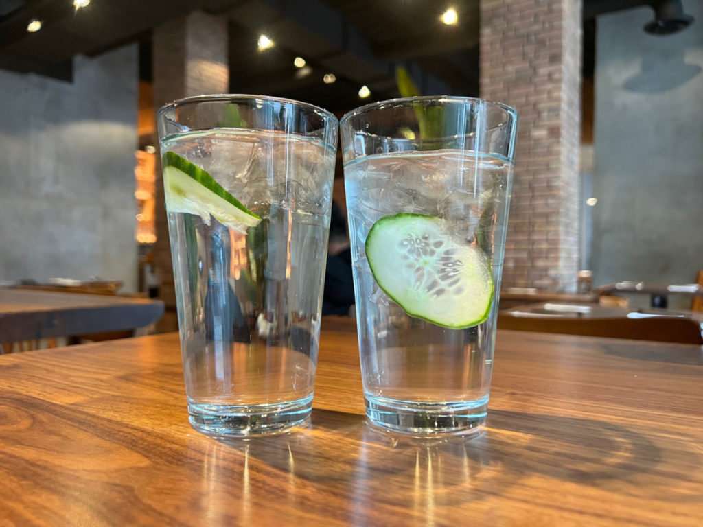 Two cups of cucumber water at Tenkyu restaurant.